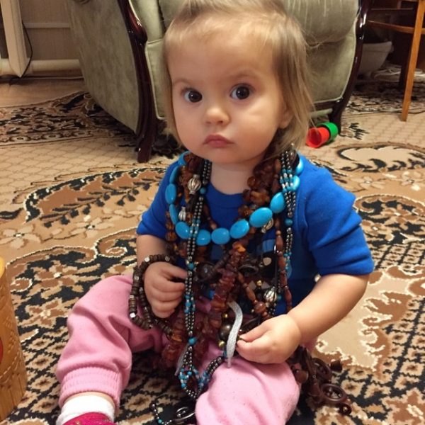 Nika wearing necklaces